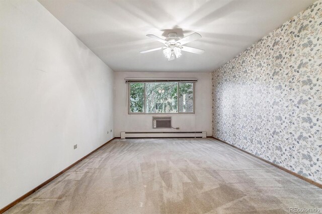 carpeted spare room featuring ceiling fan, baseboard heating, and a wall mounted air conditioner