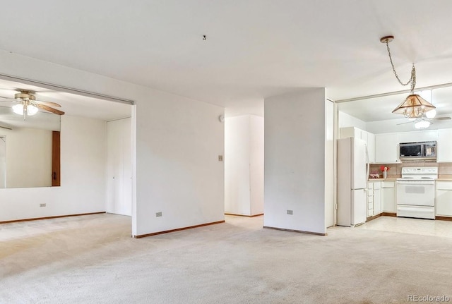 unfurnished living room with light carpet and ceiling fan