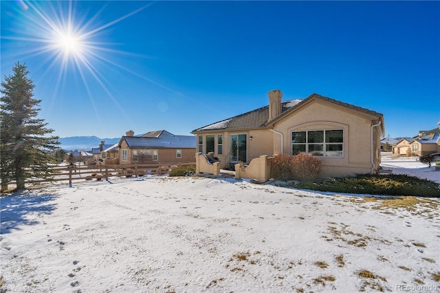 view of snow covered property