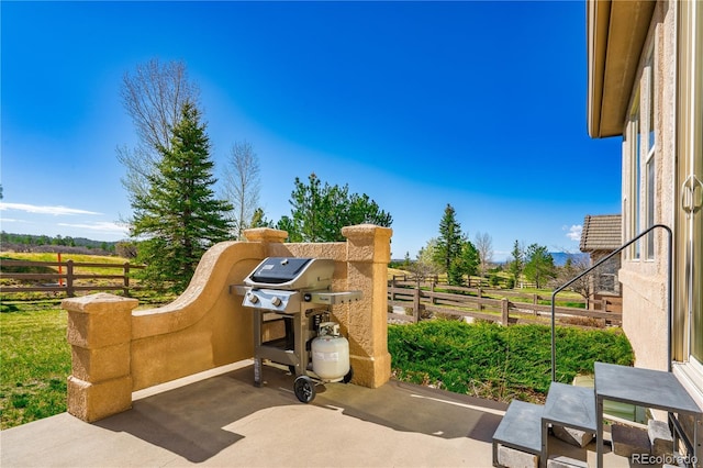 2663 Cinnabar Rd, Colorado Springs, CO 80921 - view of patio / terrace with fence and a rural view