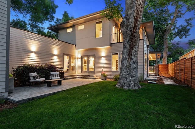 2377 S Humboldt St, Denver, CO 80210 - back of house with a patio and a balcony