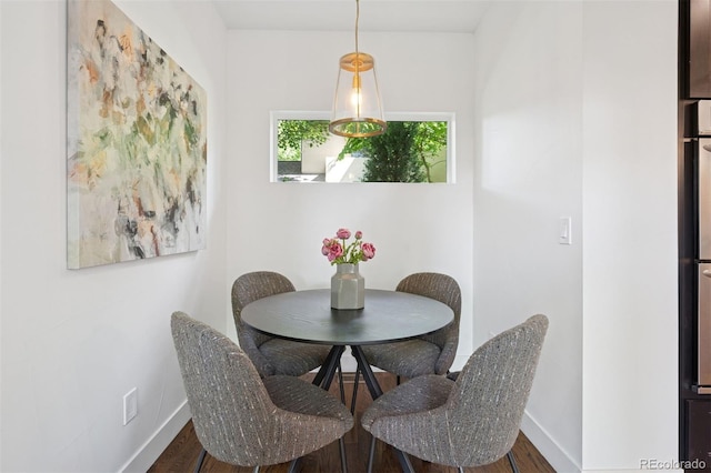 2377 S Humboldt St, Denver, CO 80210 - dining space with wood finished floors