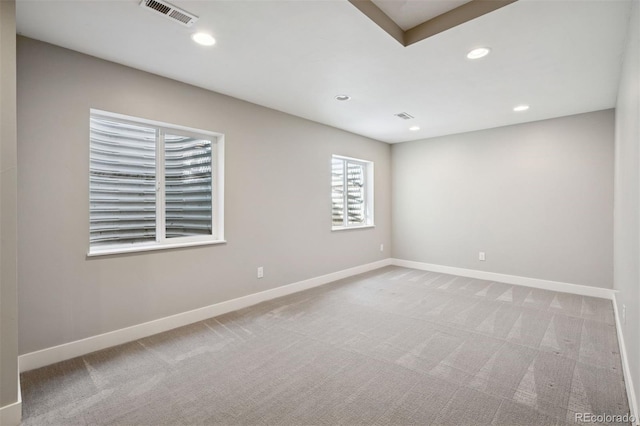 2377 S Humboldt St, Denver, CO 80210 - carpeted empty room with baseboards and recessed lighting