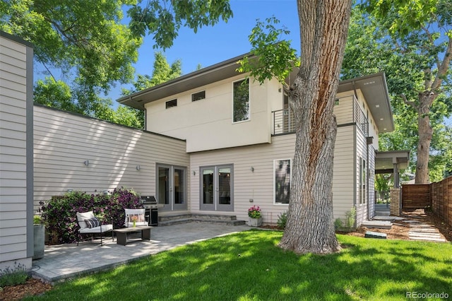2377 S Humboldt St, Denver, CO 80210 - back of house featuring french doors and a patio area