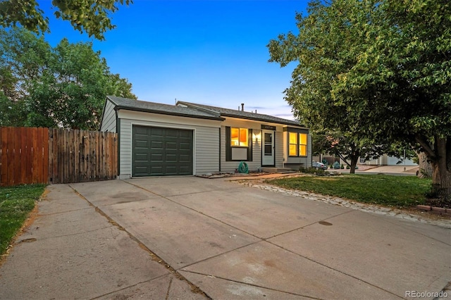 20714 E Buchanan Dr, Aurora, CO 80011 - ranch-style house featuring concrete driveway and an attached garage