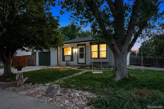 20714 E Buchanan Dr, Aurora, CO 80011 - view of front of house featuring a garage and concrete driveway
