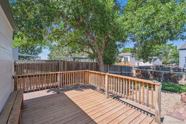 20714 E Buchanan Dr, Aurora, CO 80011 - wooden deck with a fenced backyard