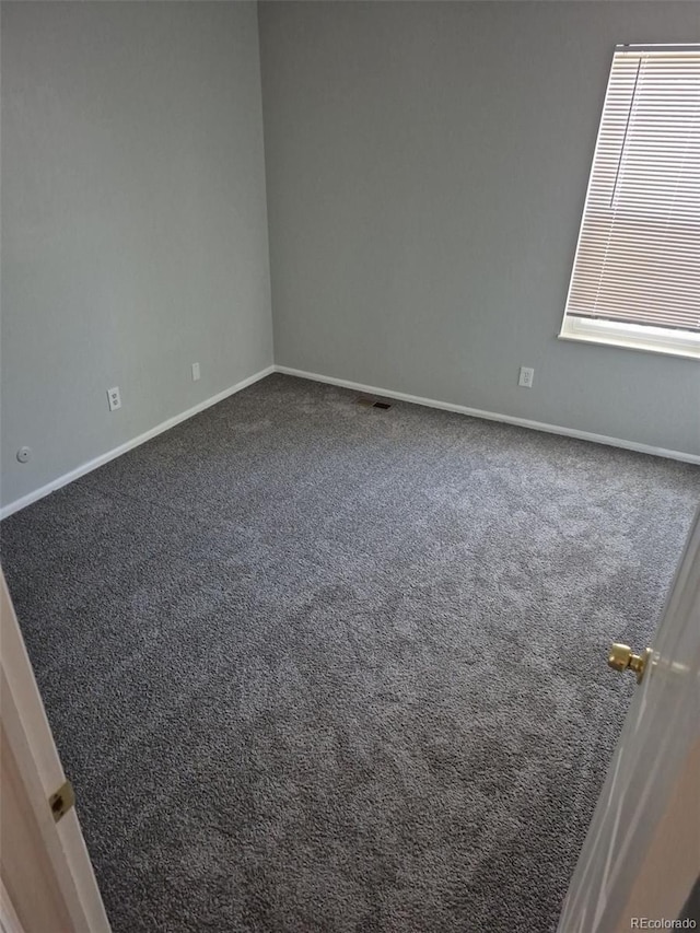 16835 E Harvard Pl, Aurora, CO 80013 - unfurnished room with carpet and baseboards