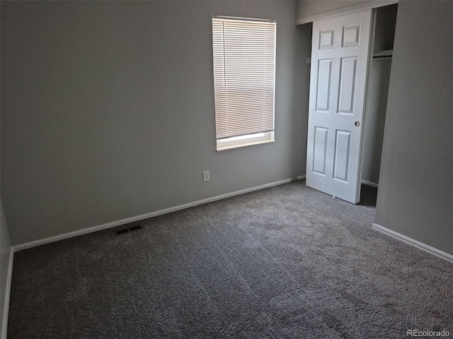 16835 E Harvard Pl, Aurora, CO 80013 - unfurnished bedroom featuring carpet, baseboards, and a closet