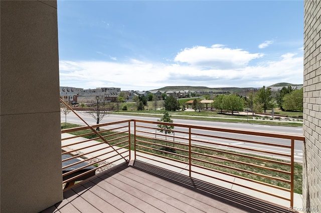 wooden terrace with a mountain view