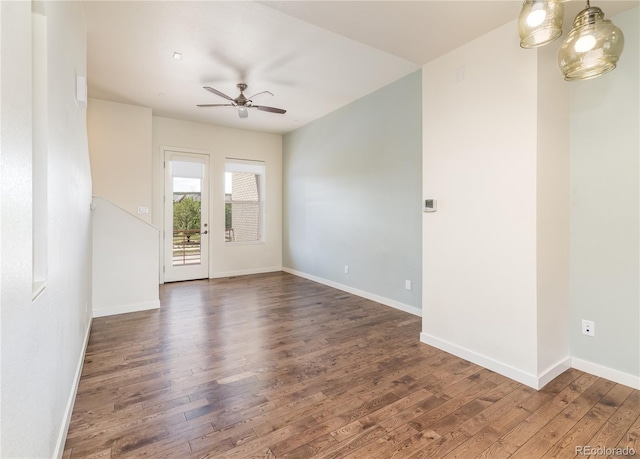 10154 Belvedere Loop, Lone Tree, CO 80124 - spare room with wood finished floors, ceiling fan, and baseboards