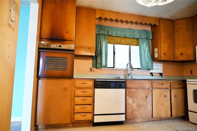 kitchen with sink and white appliances