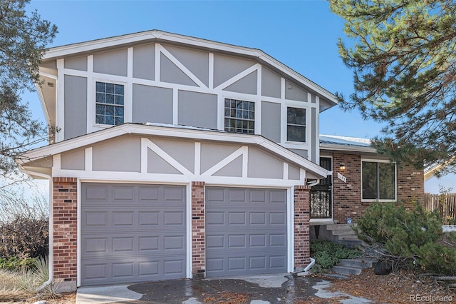 tudor home with a garage