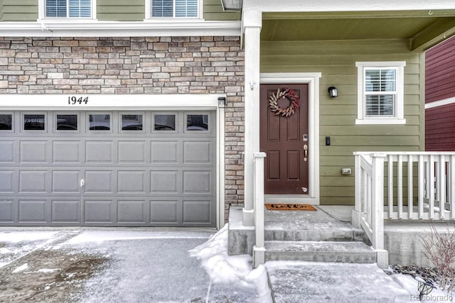 property entrance featuring a garage