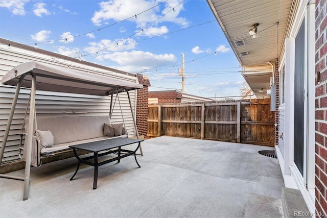 view of patio / terrace with fence