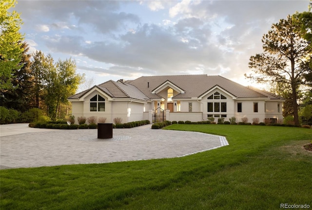4935 E Preserve Ln, Greenwood Village, CO 80121 - single story home featuring a tile roof, a front yard, and stucco siding