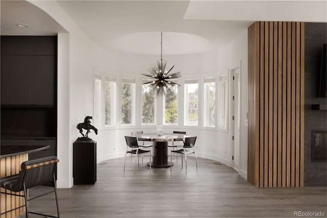 4935 E Preserve Ln, Greenwood Village, CO 80121 - dining space featuring plenty of natural light, wood finished floors, and a chandelier