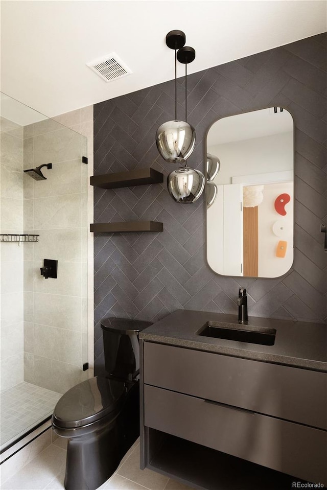 4935 E Preserve Ln, Greenwood Village, CO 80121 - bathroom featuring vanity and a tile shower