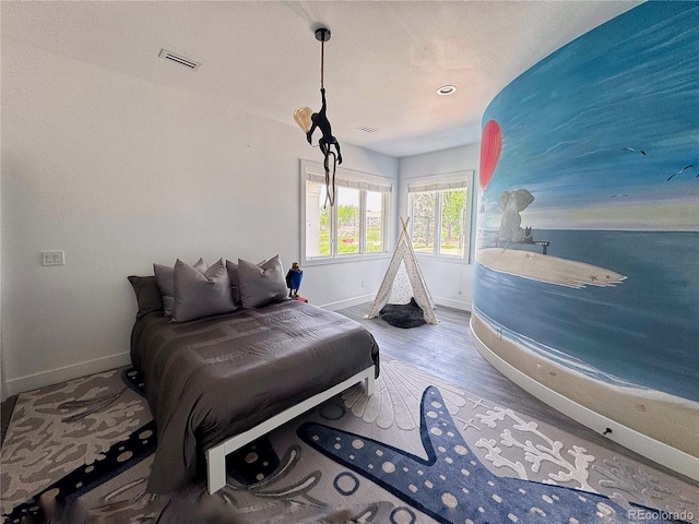 4935 E Preserve Ln, Greenwood Village, CO 80121 - bedroom with wood finished floors and recessed lighting