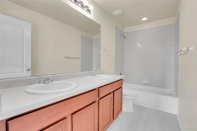 full bathroom with a sink, toilet, double vanity, and  shower combination