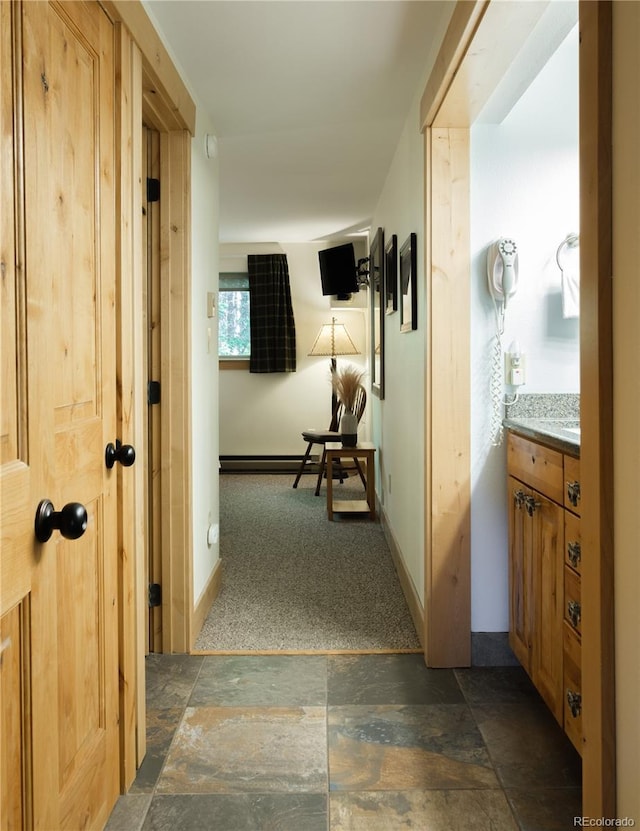 hallway with a baseboard radiator