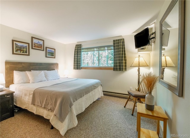 carpeted bedroom featuring baseboard heating