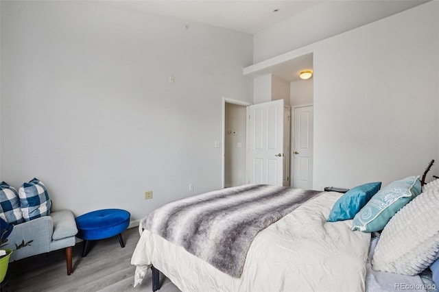 9692 W Coco Cir Unit 304, Littleton, CO 80128 - bedroom with light wood-style floors