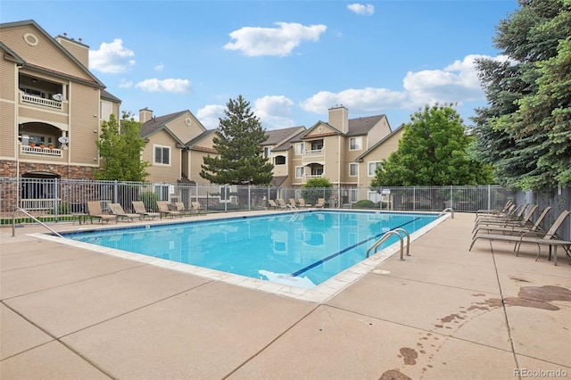 9692 W Coco Cir Unit 304, Littleton, CO 80128 - community pool featuring a residential view and a patio area