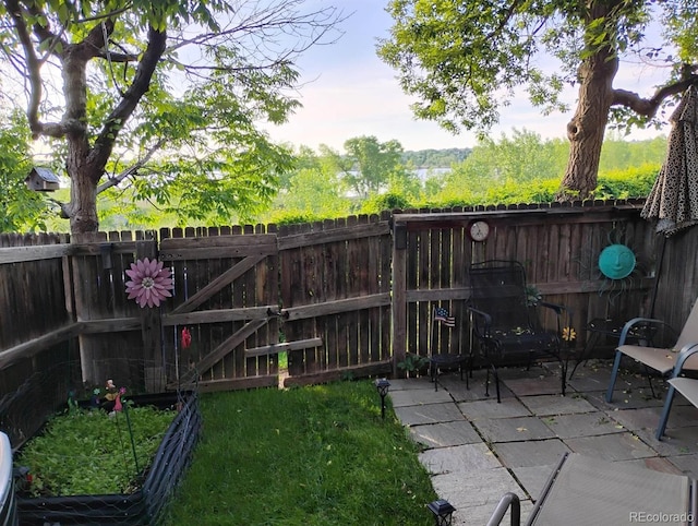 17467 E Rice Cir Unit C, Aurora, CO 80015 - fenced backyard with a patio area