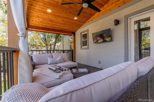 view of patio / terrace with an outdoor living space and a ceiling fan