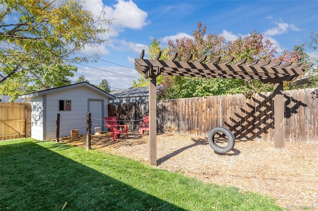 view of yard featuring a fenced backyard and an outbuilding