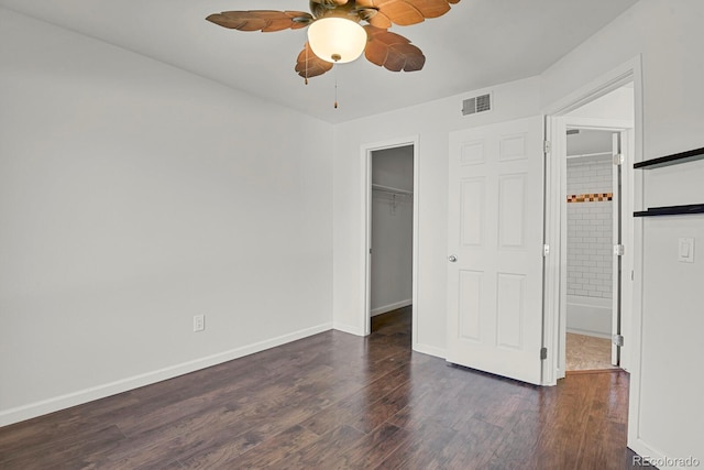 5250 S Huron Way Unit 3-205, Littleton, CO 80120 - unfurnished bedroom with wood finished floors, baseboards, and a closet