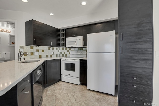 5250 S Huron Way Unit 3-205, Littleton, CO 80120 - kitchen with white appliances, a sink, backsplash, light stone counters, and recessed lighting