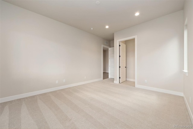 1724 Barefoot Dr, Windsor, CO 80550 - unfurnished room with light carpet, recessed lighting, and baseboards