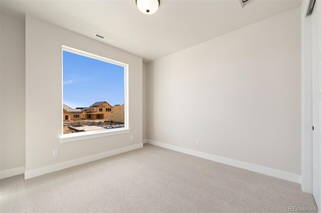 1724 Barefoot Dr, Windsor, CO 80550 - empty room featuring carpet flooring and baseboards