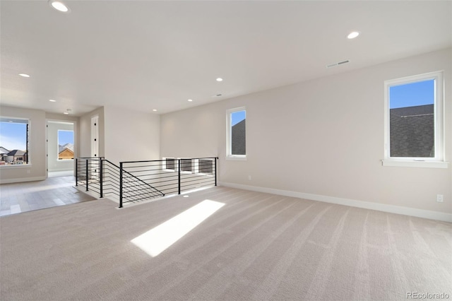1724 Barefoot Dr, Windsor, CO 80550 - empty room with recessed lighting, baseboards, and light colored carpet