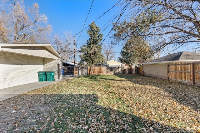 view of yard featuring a fenced backyard