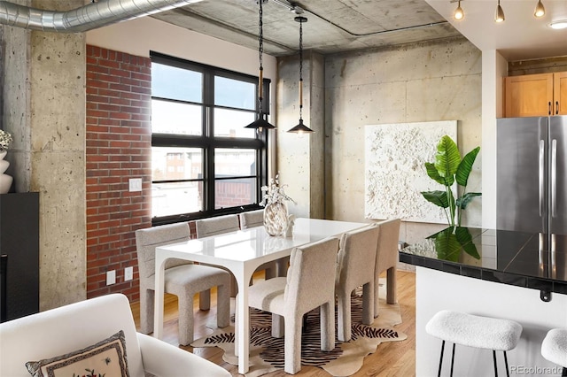 dining room with light wood-type flooring