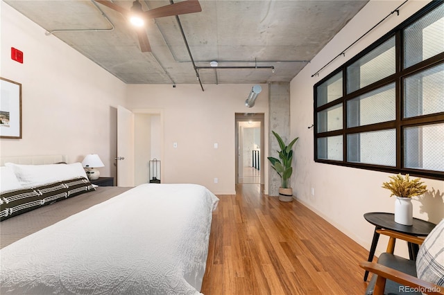 bedroom featuring wood finished floors