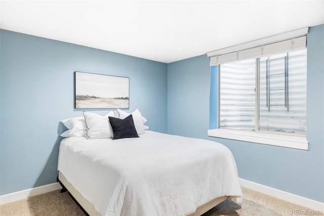 bedroom featuring baseboards