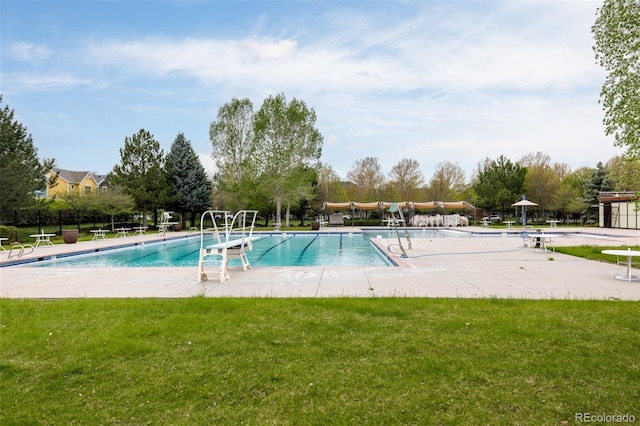 pool featuring a lawn