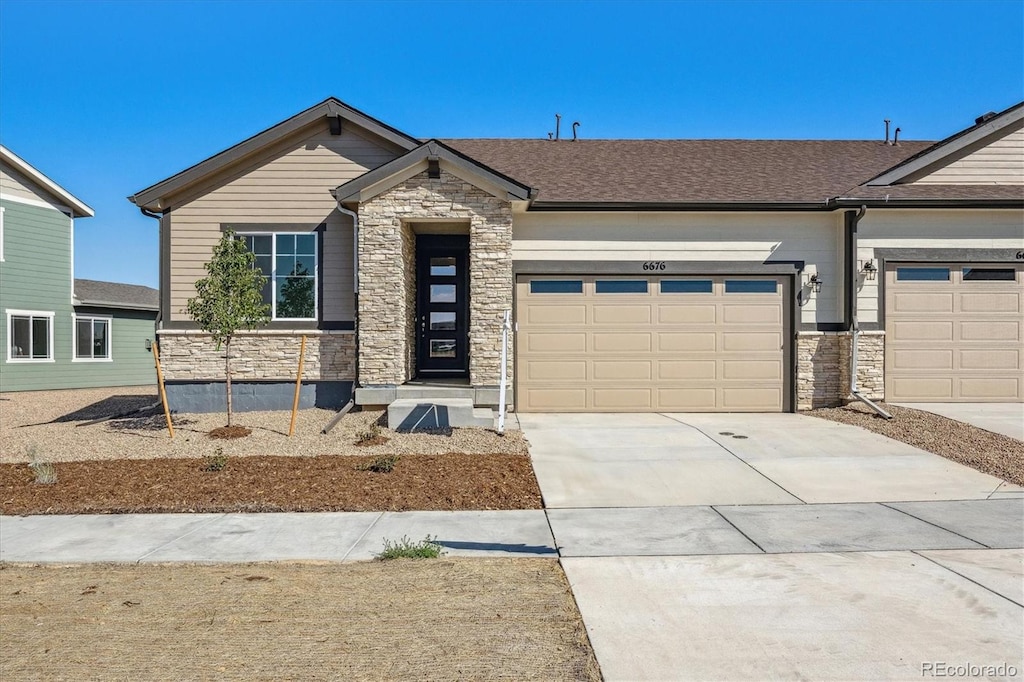 view of front of property with a garage