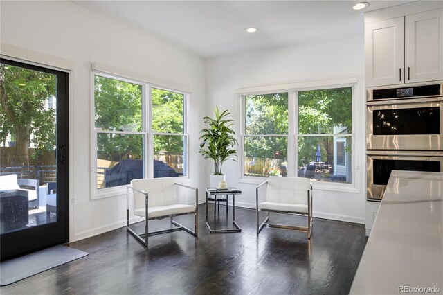 11389 E Maplewood Ave, Englewood, CO 80111 - sitting room featuring wood finished floors and recessed lighting