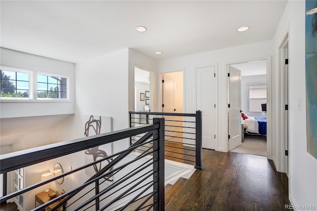 11389 E Maplewood Ave, Englewood, CO 80111 - hallway with an upstairs landing, dark wood-style flooring, and recessed lighting