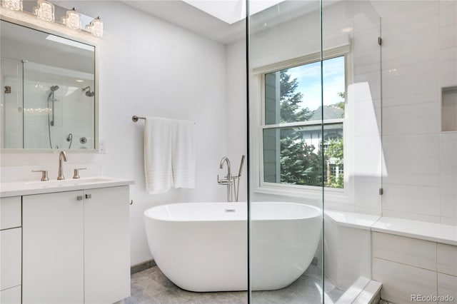 11389 E Maplewood Ave, Englewood, CO 80111 - full bath featuring a freestanding tub, vanity, and a shower stall