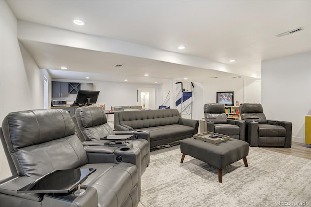 11389 E Maplewood Ave, Englewood, CO 80111 - living area with light wood-style floors and recessed lighting