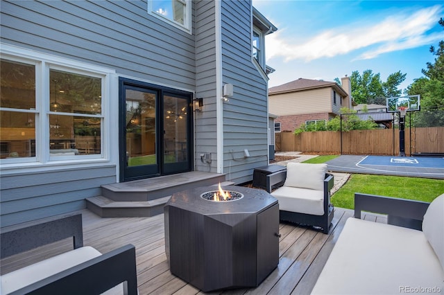 11389 E Maplewood Ave, Englewood, CO 80111 - deck featuring an outdoor living space with a fire pit