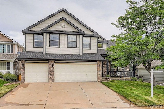 22367 Quail Run Dr, Parker, CO 80138 - view of front of house featuring a garage, a shingled roof, driveway, a front yard, and stone siding