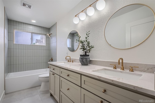 22367 Quail Run Dr, Parker, CO 80138 - bathroom with double vanity, washtub / shower combination, tile patterned floors, and a textured wall