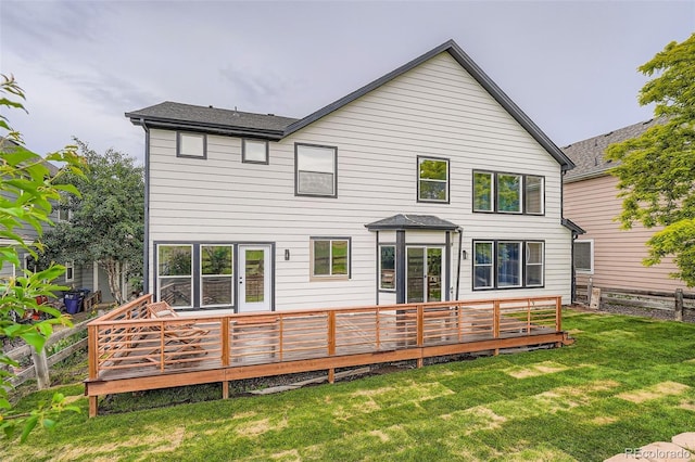 22367 Quail Run Dr, Parker, CO 80138 - rear view of house featuring a lawn and a wooden deck